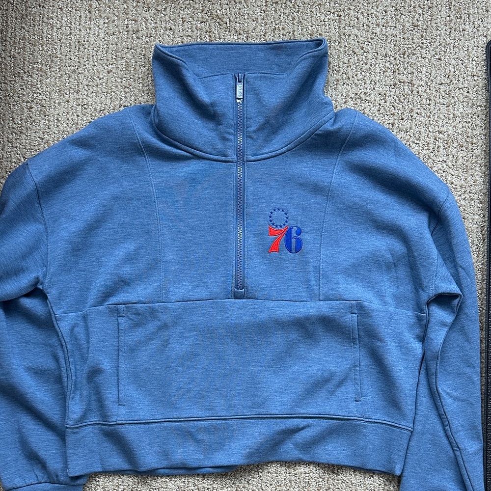 Phila 76ers Travis Mathew Blue Quarter-Zip Pullover